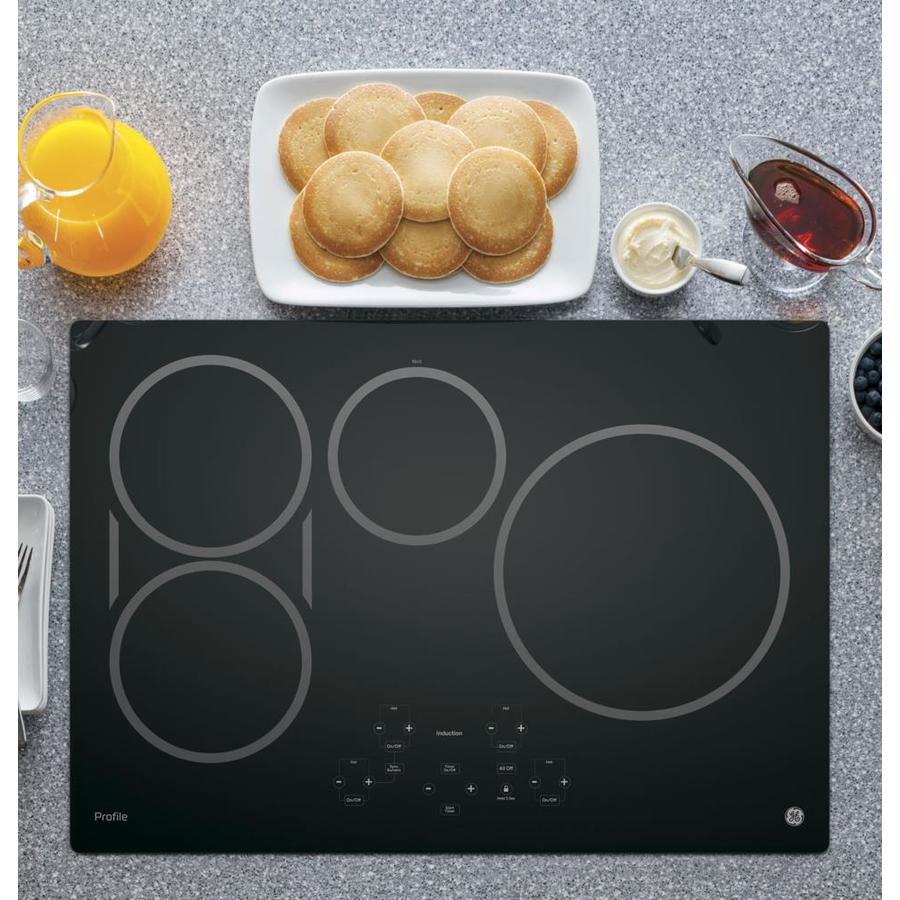 GE Profile 30in 4 Burners Black Induction Cooktop in the Induction