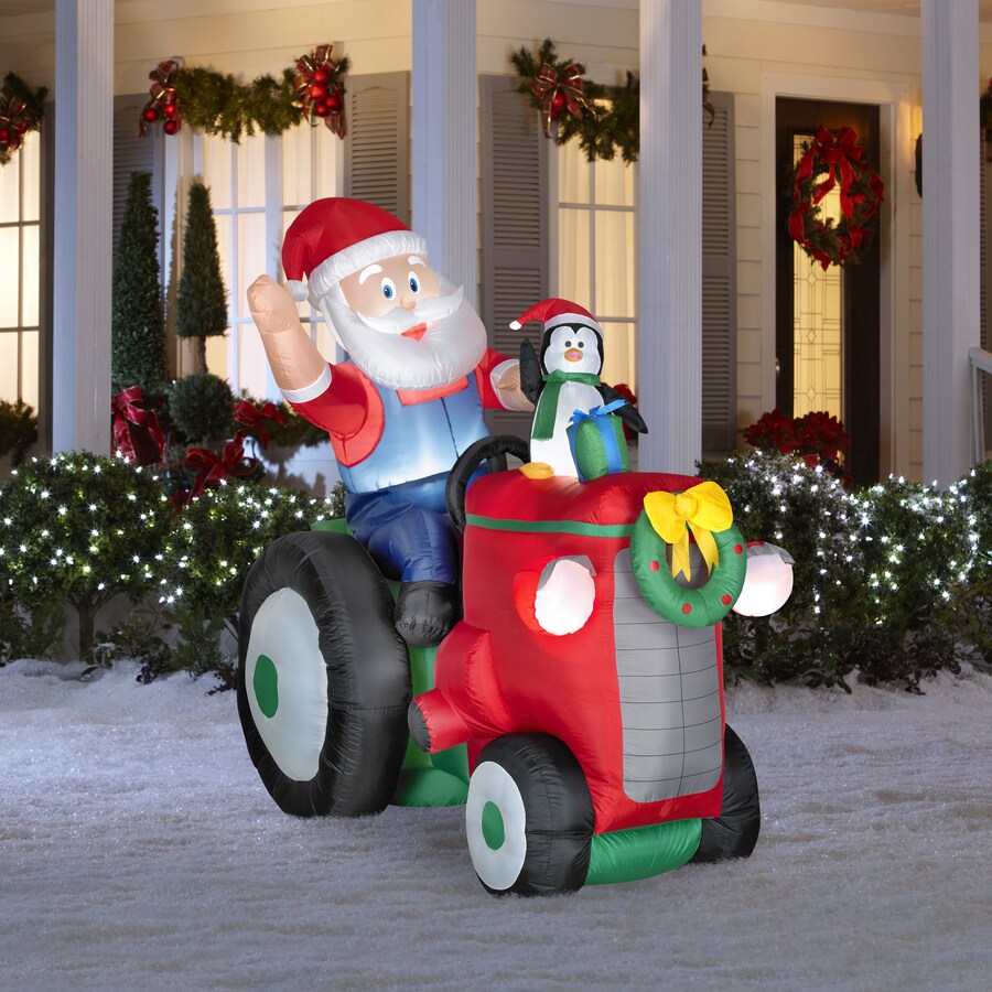 Holiday Living 5.51-ft Inflatable Fabric Christmas Santa On Tractor At 