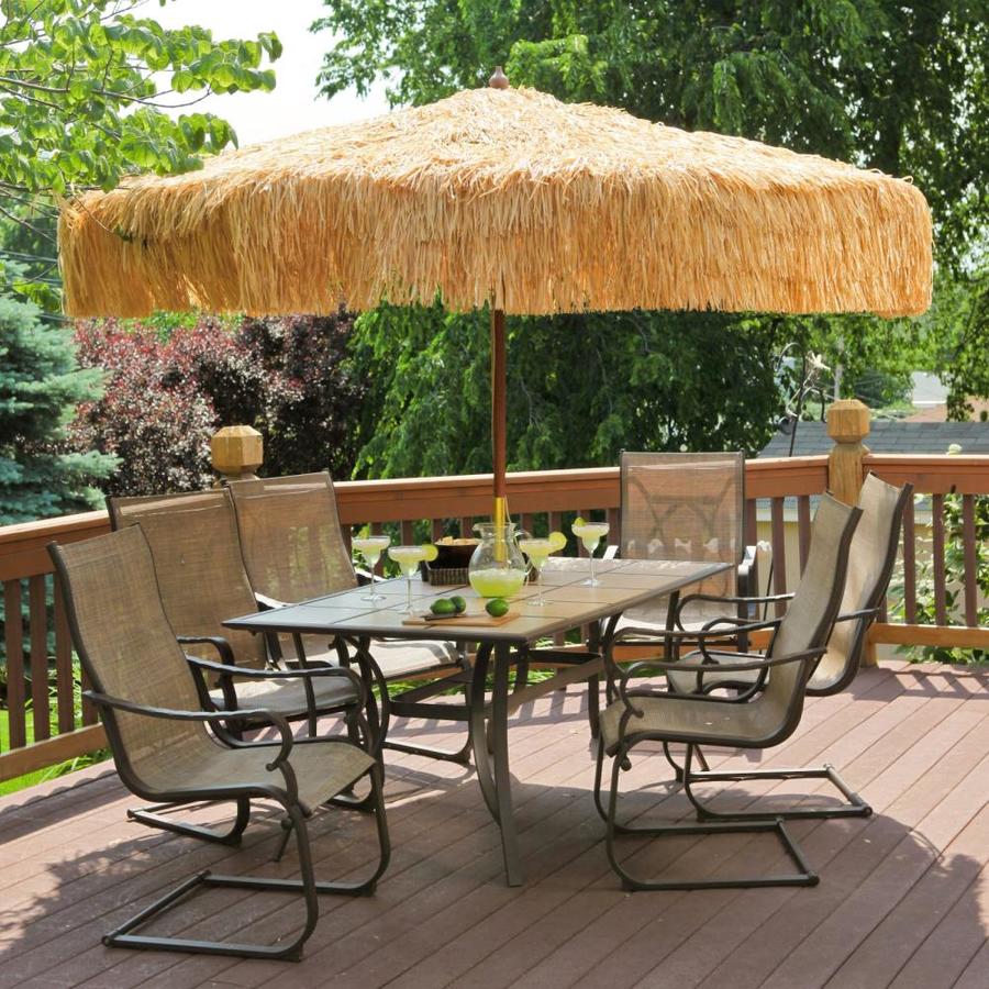 brown patio set with umbrella