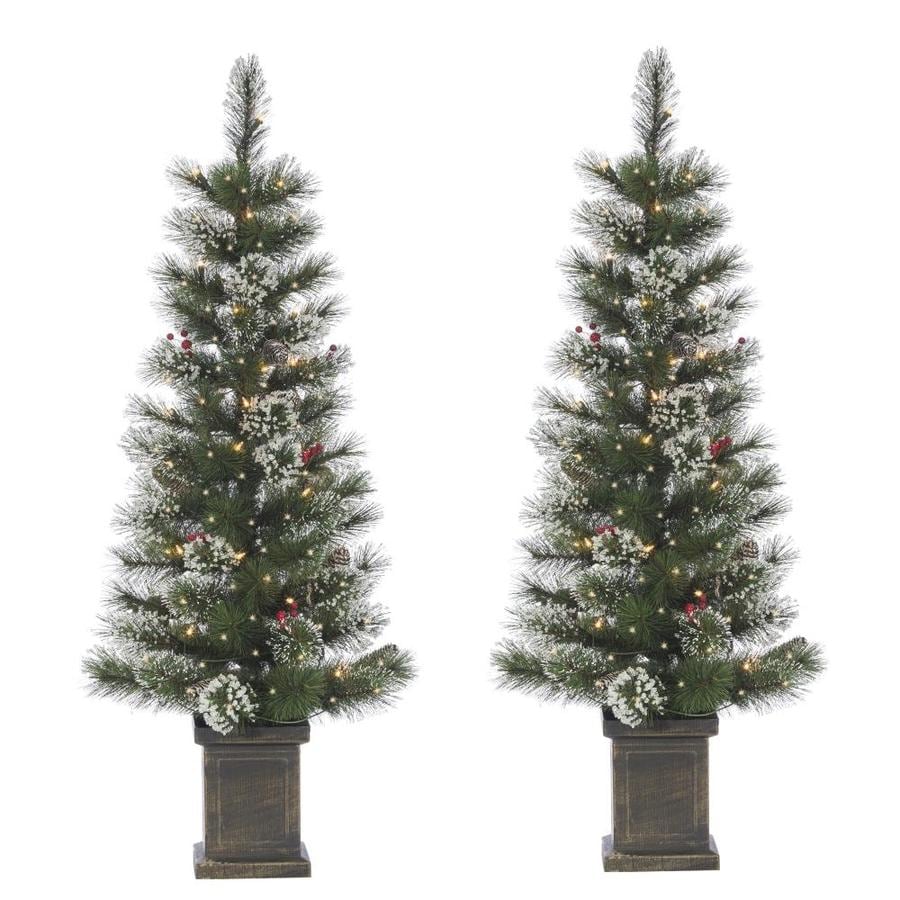 Sterling Tree Company 4-ft Pine Pre-Lit Traditional Artificial