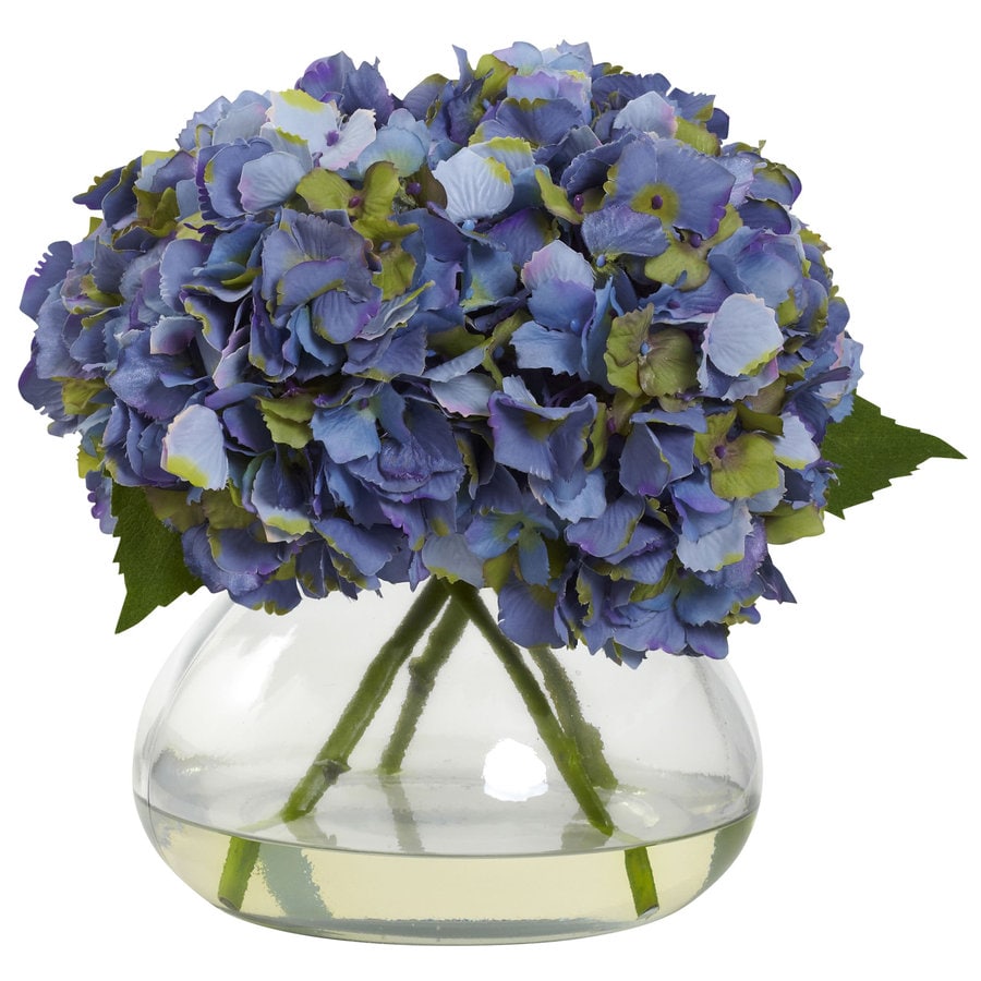 blue artificial flowers in vase