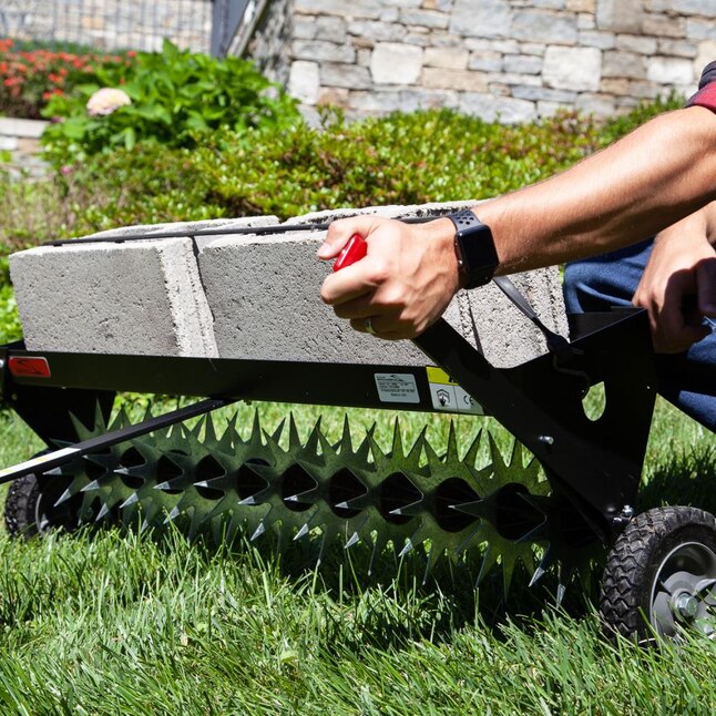 strong punch AN AWESOME MACHINE ROLL-AERATOR Lawn Aerator double-disk