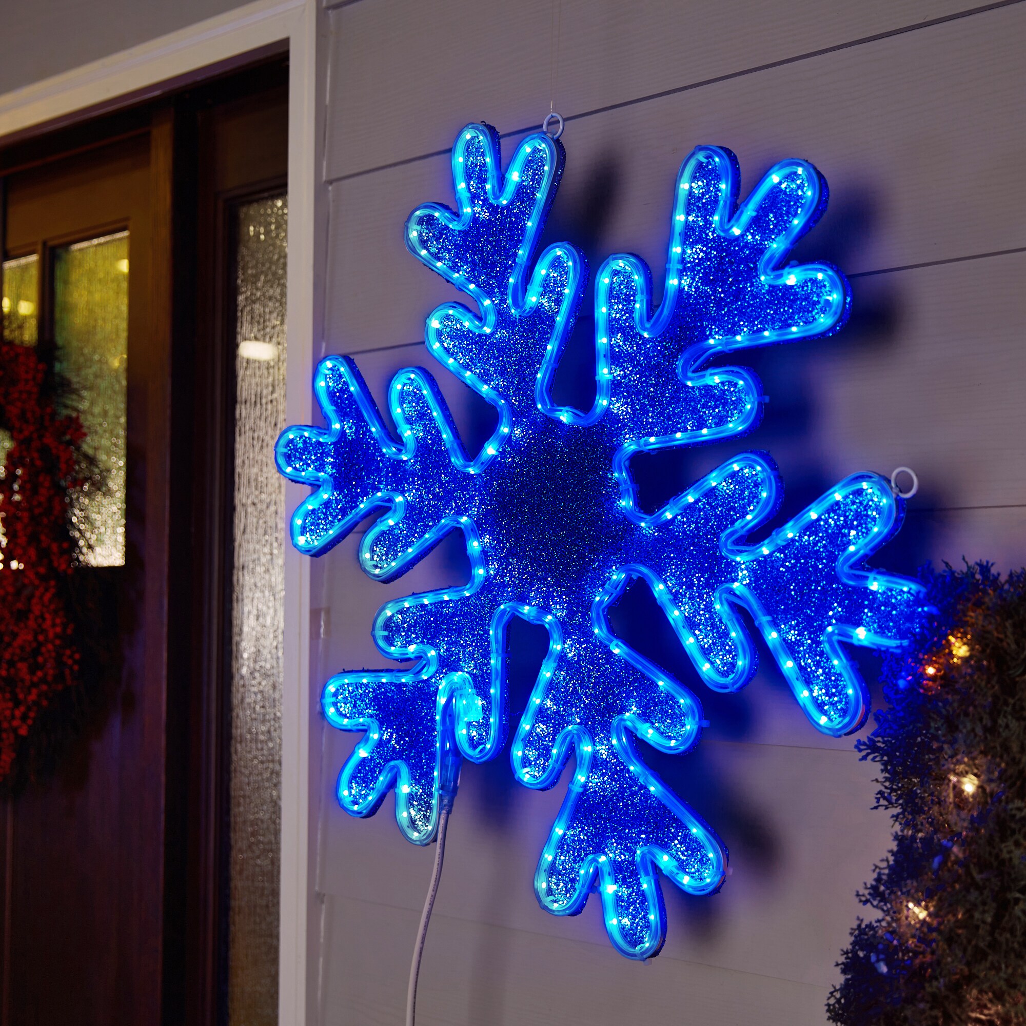 GE 28in Hanging Snowflake Snowflake with Blue LED Lights in the