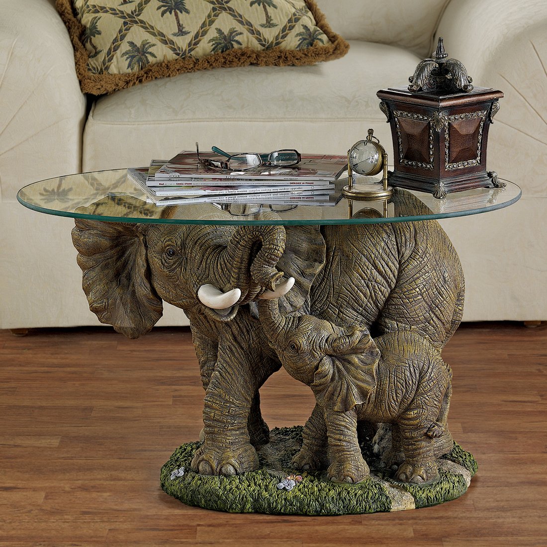 glass coffee table with elephant base