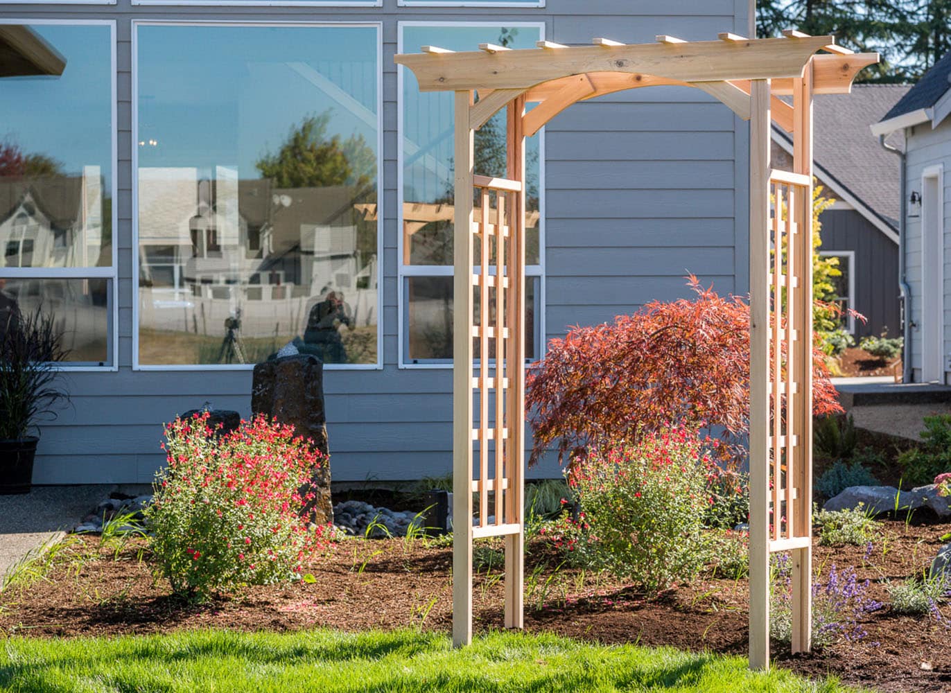 Garden Architecture 5.3-ft W x 6.8-ft H Natural Garden Arbor in the