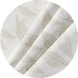 A white polyester curtain with a leaf design.