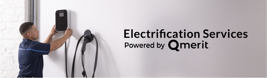 A professional independent installer completing installation of a home electronic vehicle charger.
