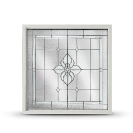 An accent window with a white frame and decorative privacy glass.