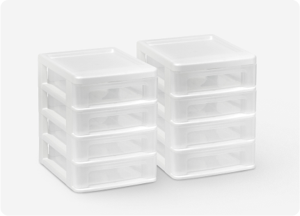 Two white storage containers with 4 clear drawers each.