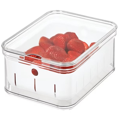 A clear plastic berry bin.