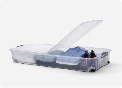 A clear, slim plastic container for underbed clothes storage.