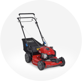 A red Toro gas self-propelled lawn mower.