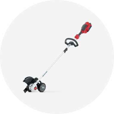 A red Toro Flex Force cordless lawn edger.