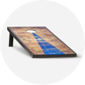A cornhole board with a blue triangle design.