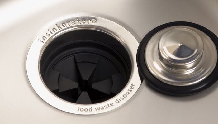 how to remove a garbage disposal collar