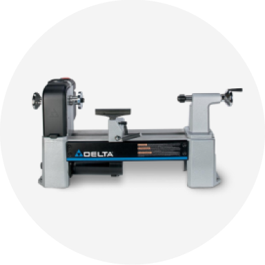 A gray DELTA wood lathe. 