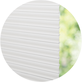 A close-up of white mini-blinds.