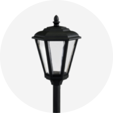 A black metal landscape light with frosted glass.