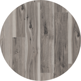 A gray wood-look laminate flooring swatch.