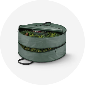 A green wreath storage bag with 2 zippered compartments.