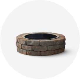 A D I Y round fire pit made with wall block.