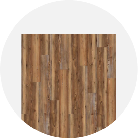 A piece of multicolor brown wood flooring.