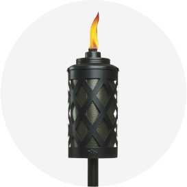 A lit black outdoor torch.