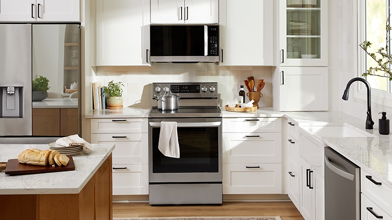 white microwave with stainless steel interior