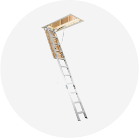 A Werner aluminum folding attic ladder extended from the opening.