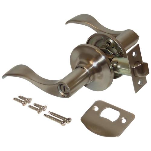 EZFLO Polished Brass Reversible Privacy Door Handle in the Door