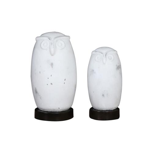 white ceramic owl figurine