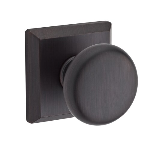 Baldwin Reserve Round Bronze Privacy Door Knob in the Door
