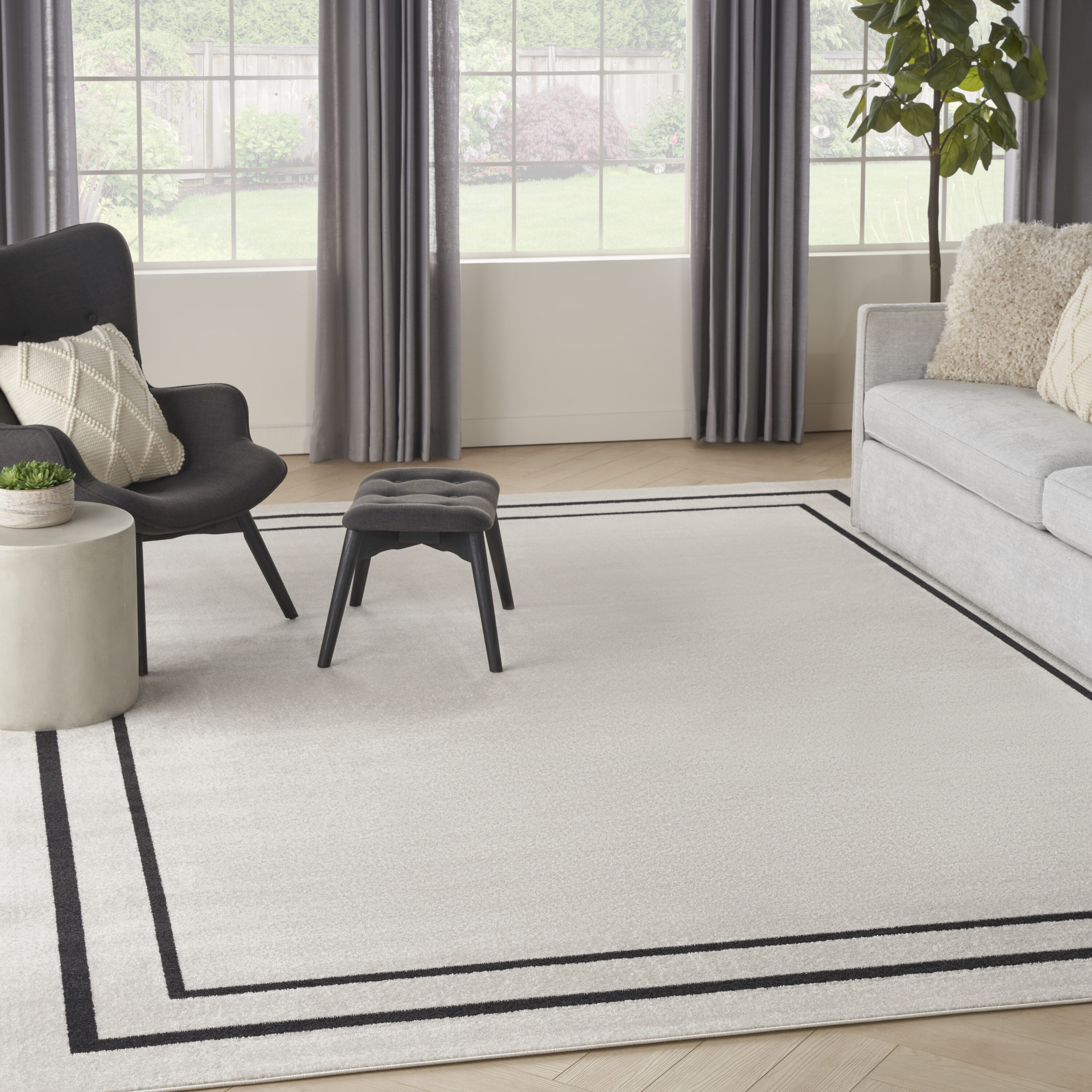 Nourison 099446148384 Essentials 8 x 10 (ft) Loomed Polypropylene Ivory/Black Rectangular Indoor/Outdoor Area rug