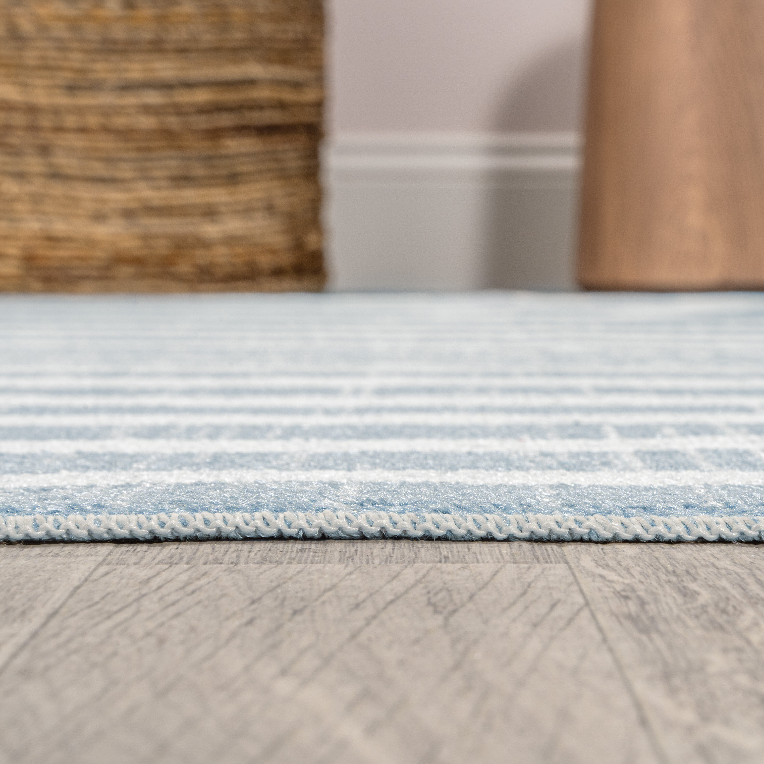 Blue and Cream Abstract Synthetic 4' x 6' Washable Area Rug