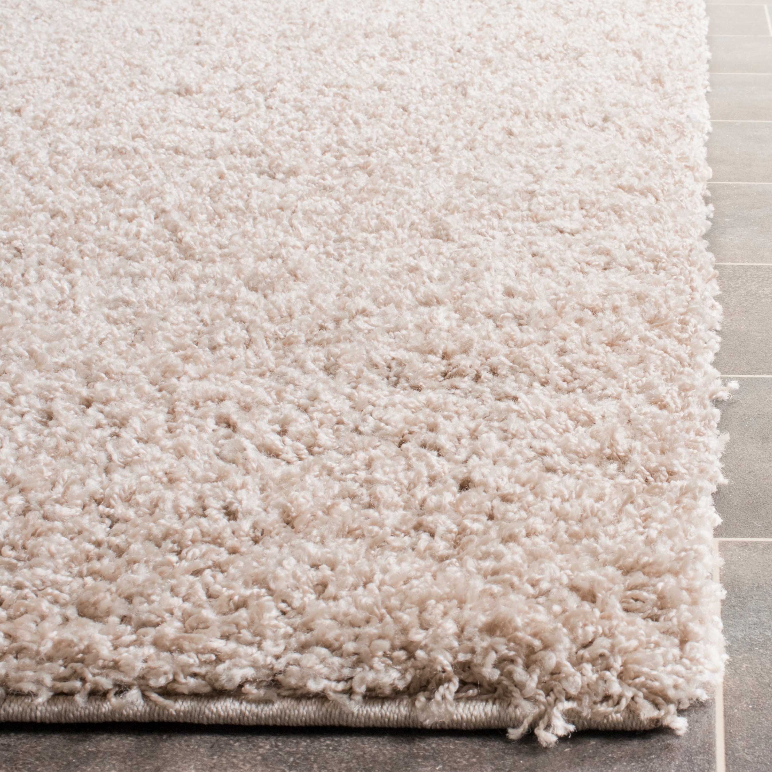 Safavieh Laguna Shag 8 x 10 Sand Indoor Solid Area Rug in the Rugs ...