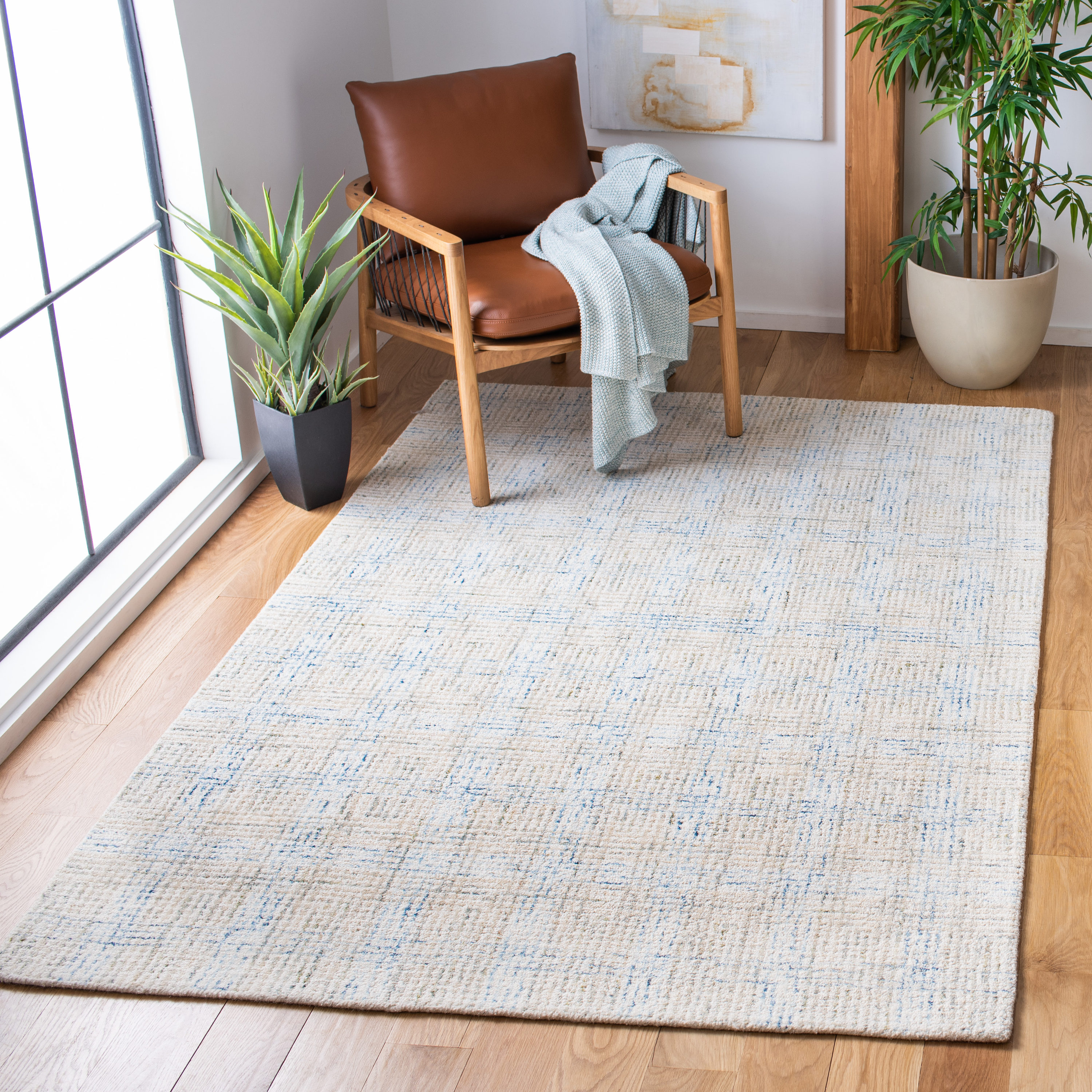 Ivory and Beige Handmade Wool Abstract Area Rug 5' x 8'