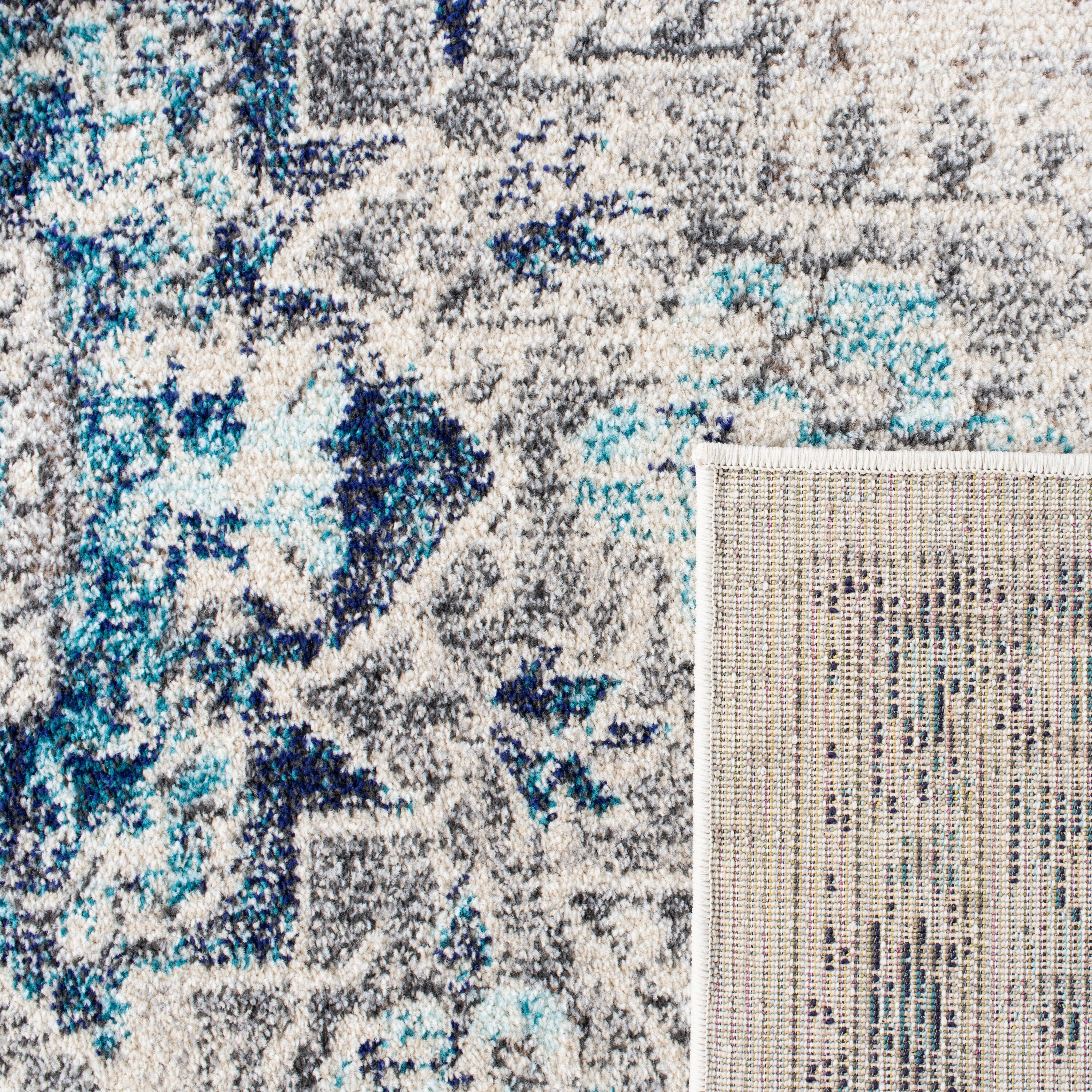 Ivory and Grey Synthetic 6' x 9' Distressed Medallion Area Rug