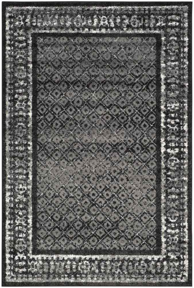 6' x 9' Black and Silver Synthetic Reversible Area Rug
