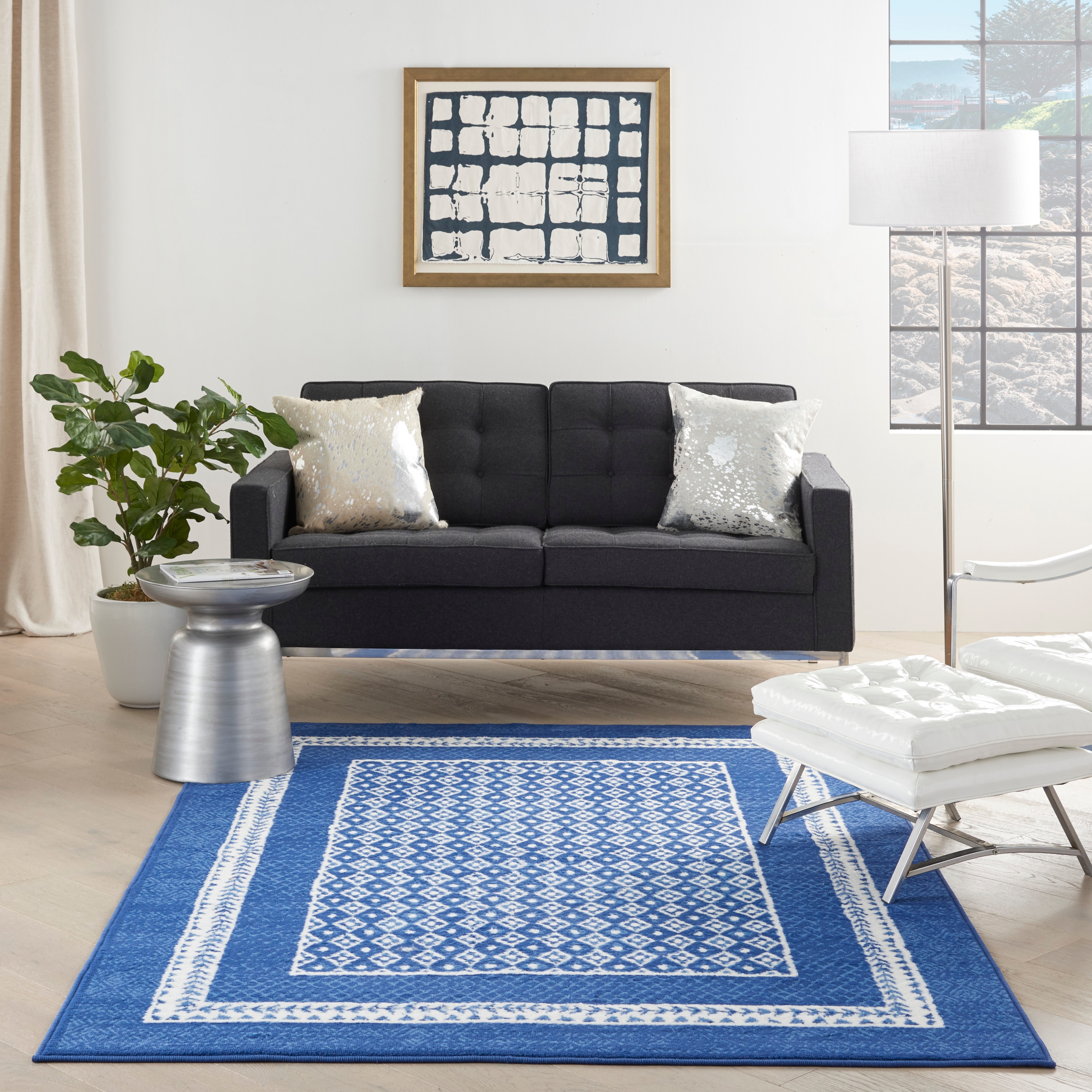 Ivory Geometric 6' x 9' Flat Woven Synthetic Area Rug