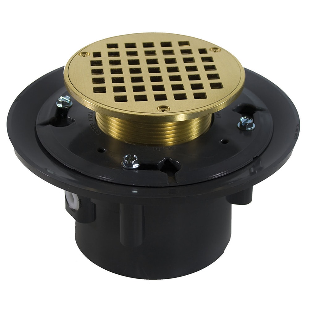 Jones Stephens 4 inch Heavy Duty PVC Floor Drain Base with 3-1/2 inch Metal Spud, 8-1/2 inch Pan and 6 inch Polished Brass Round Strainer in Gold -  D49261