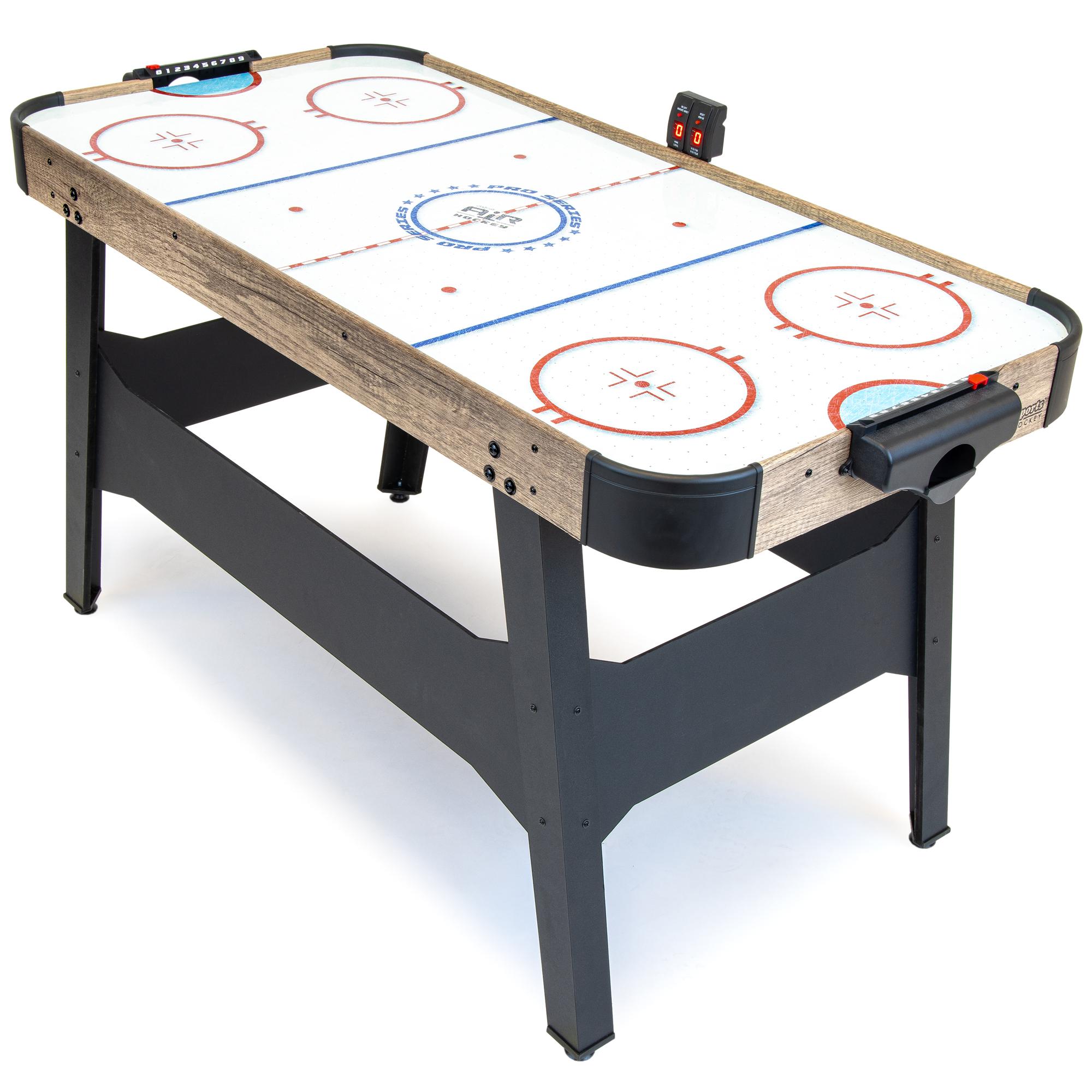 File:Air hockey table with puck and paddles.jpg - Wikimedia Commons