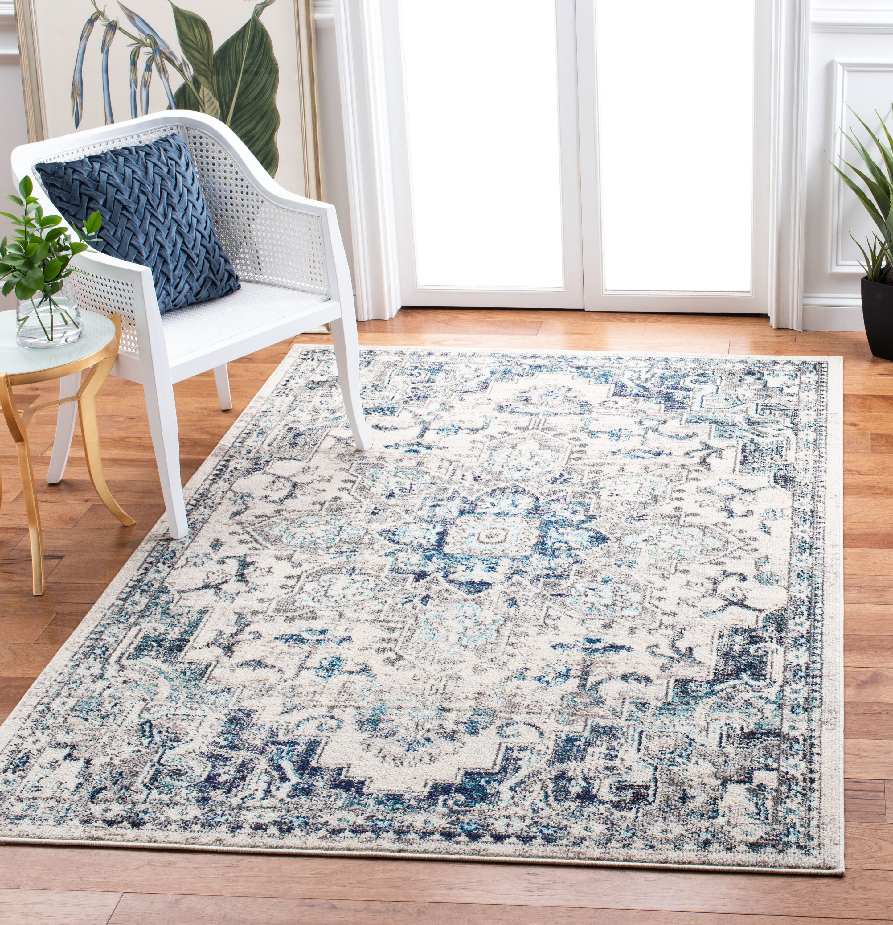 Ivory and Grey Synthetic 6' x 9' Distressed Medallion Area Rug