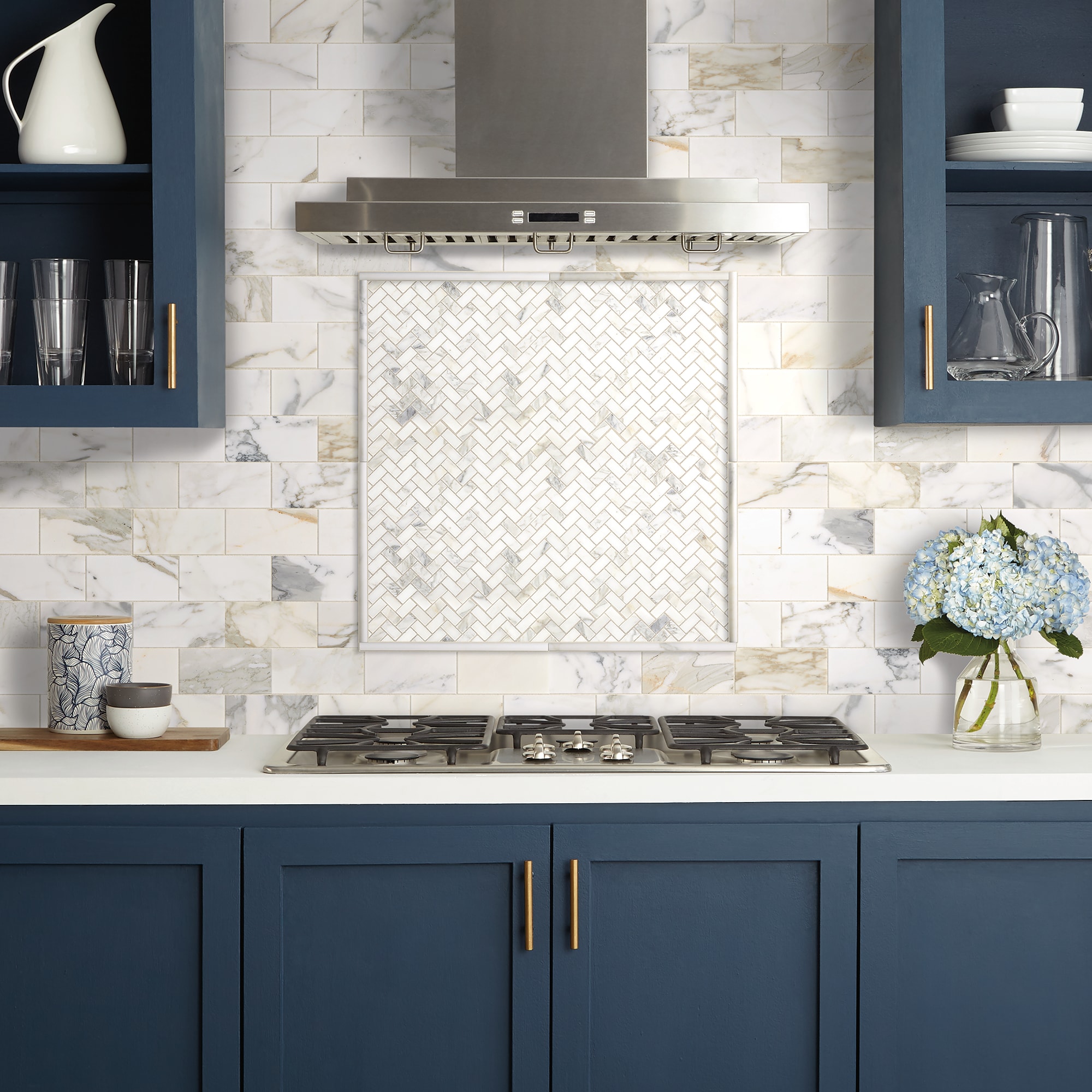 White and Gold Kitchen with Black Herringbone Floor Tiles