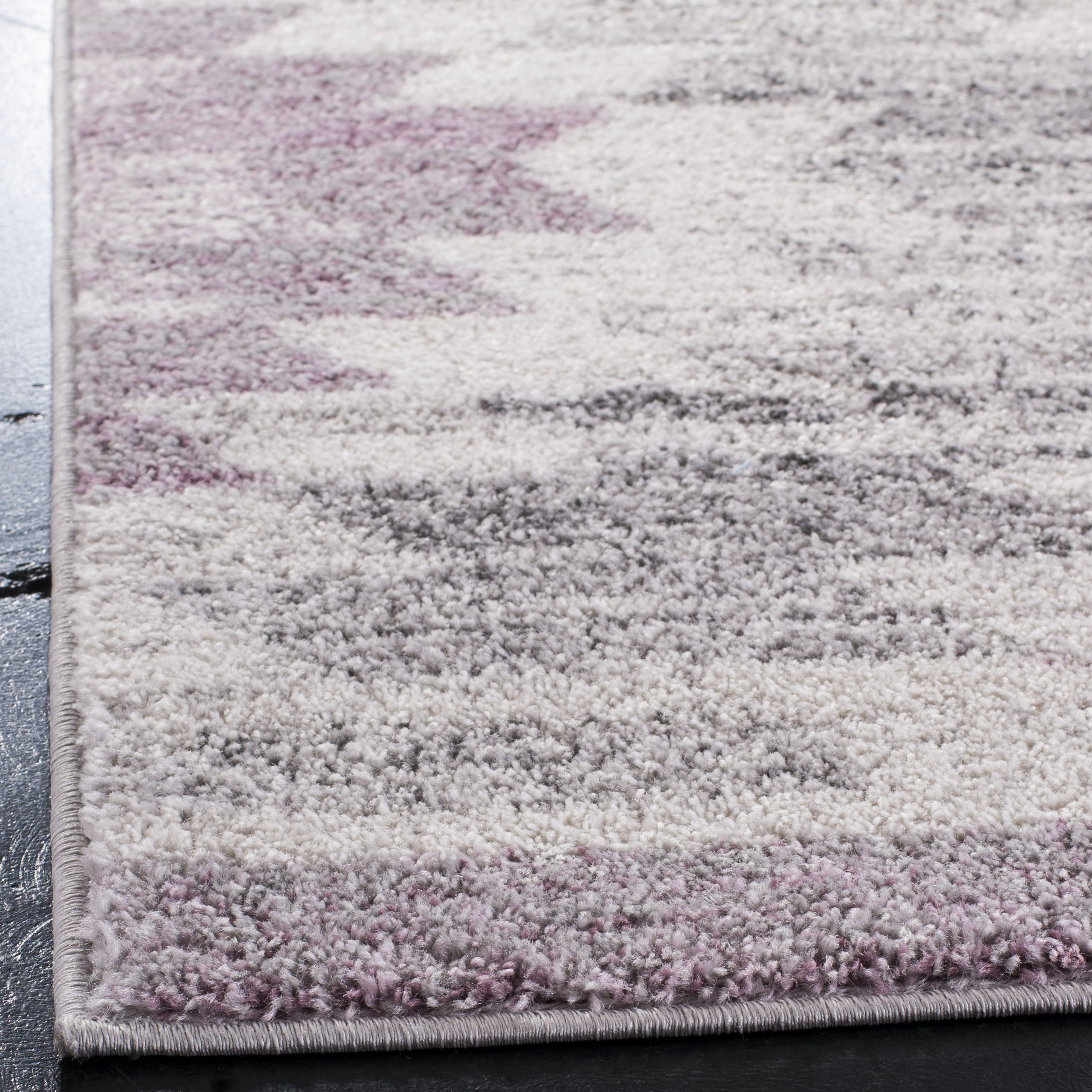 Plum and Ivory Geometric Synthetic 3' x 5' Area Rug