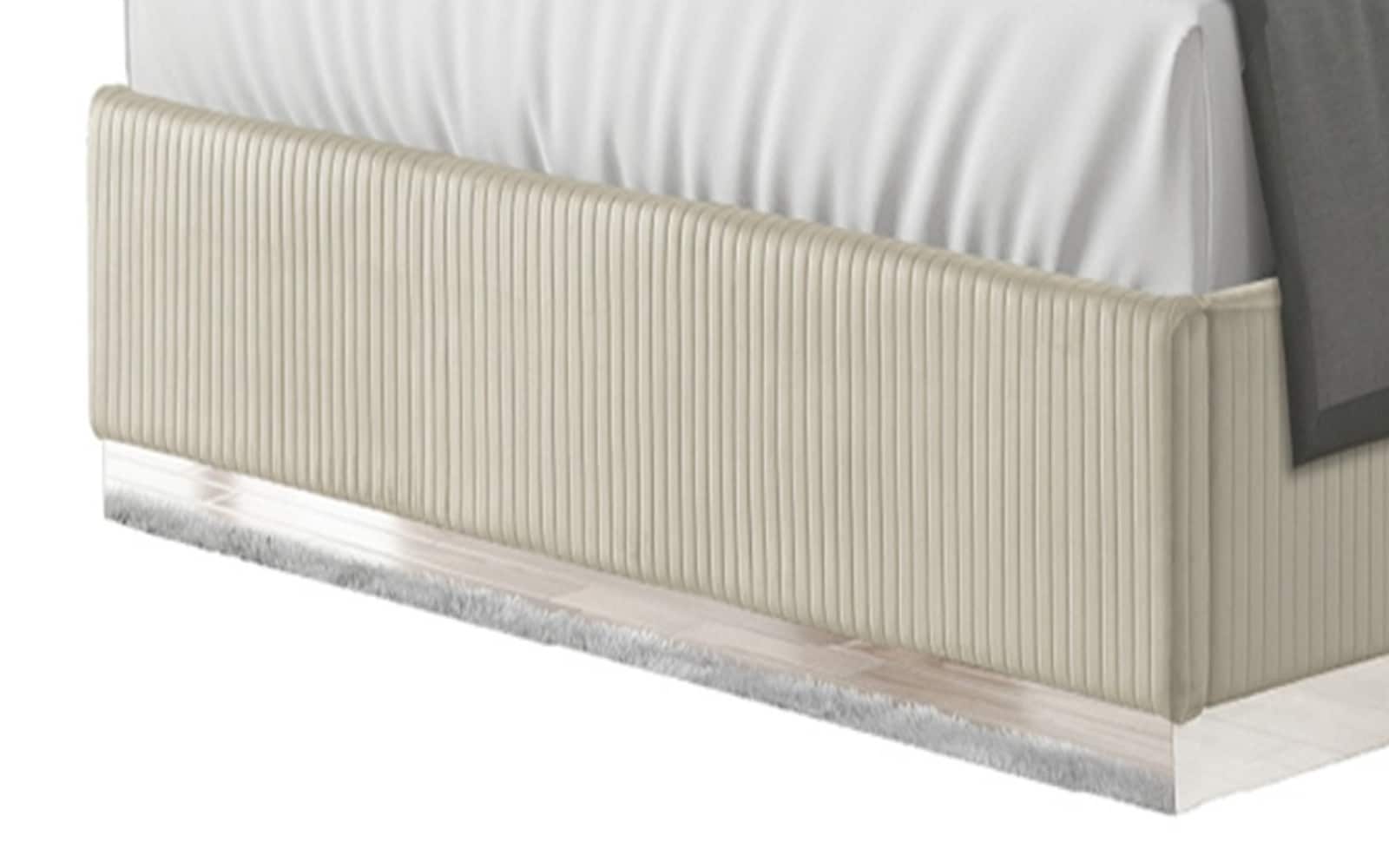 Elegant Beige Velvet King Bed with Ambient Fireplace Display