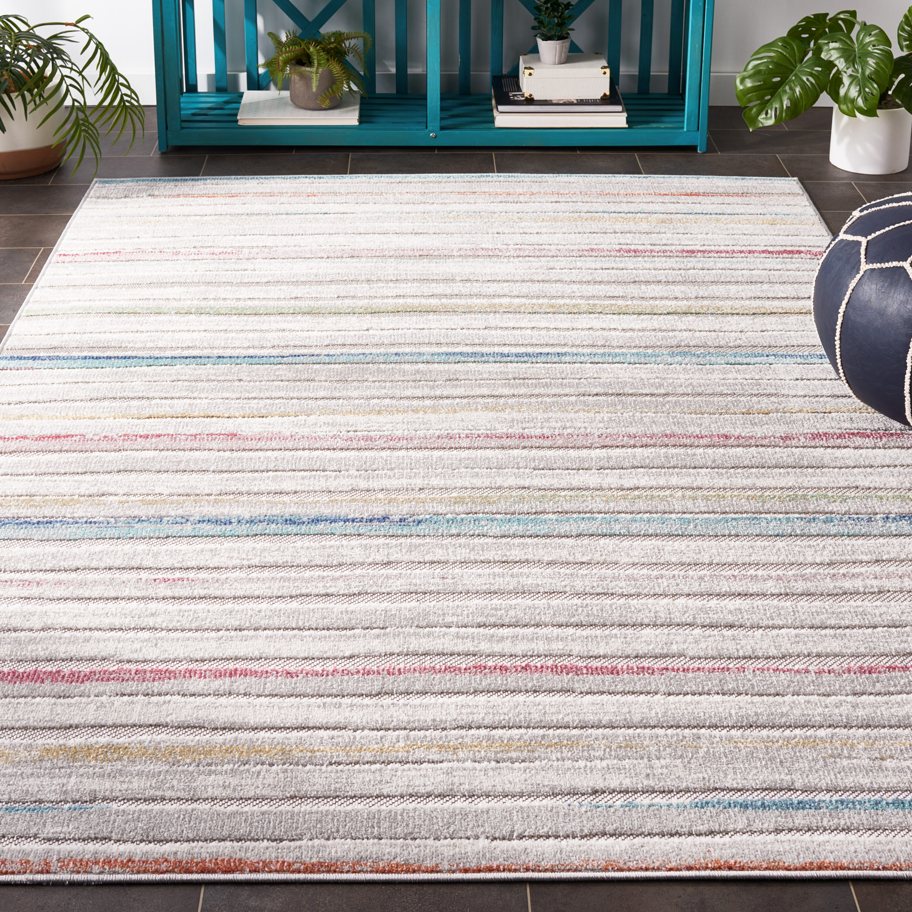 54" Round Red Geometric Synthetic Easy Care Rug