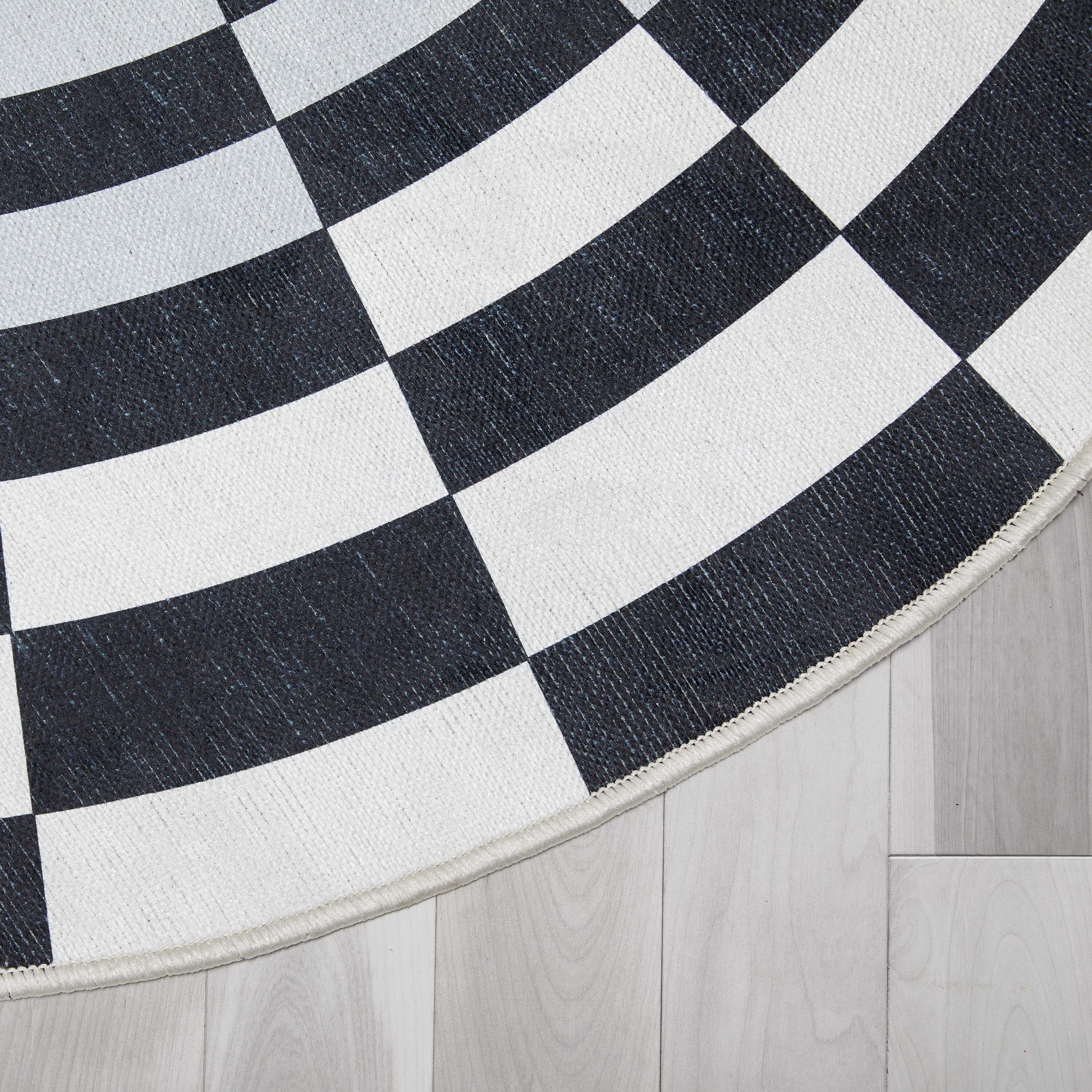 Apollo 3'3" Round Black and Ivory Polyester Chenille Area Rug