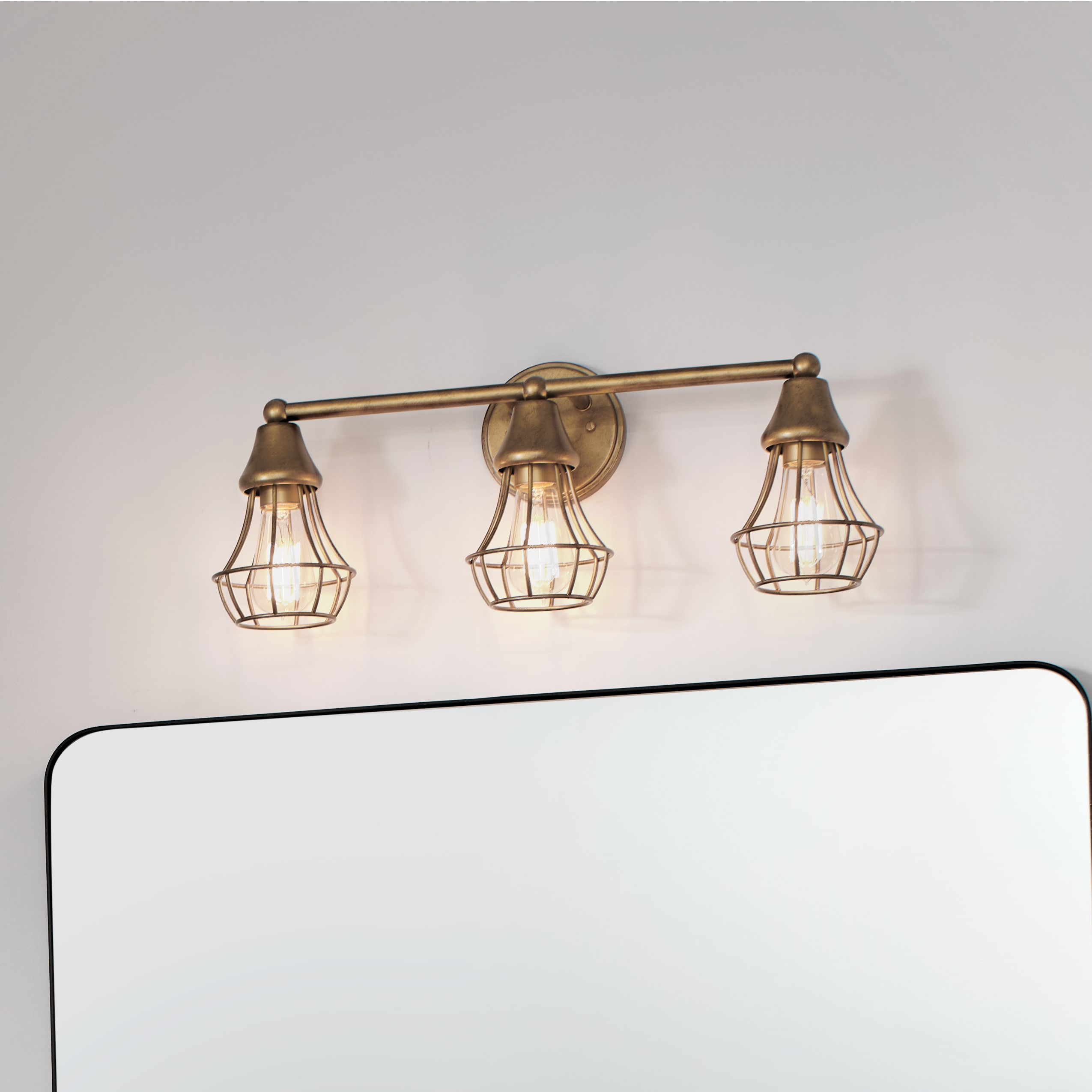 Kichler 37509 Bayley 23-in 3 -Light Brass Industrial Vanity light