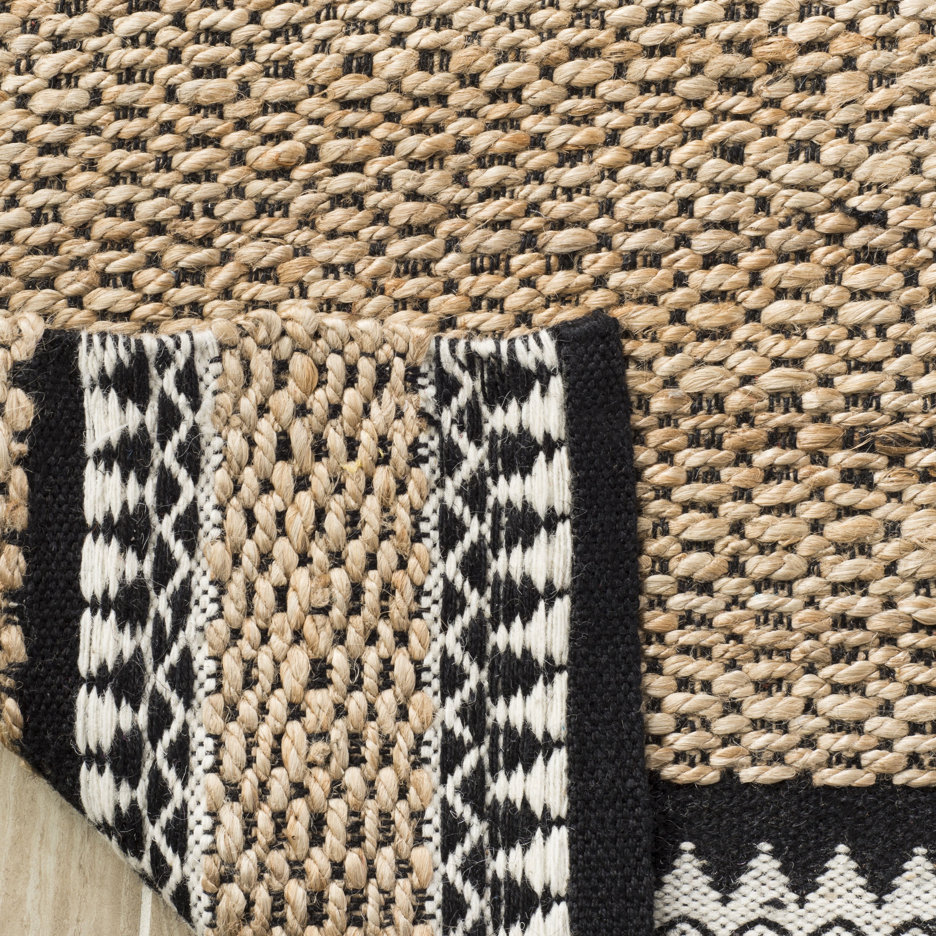Natural and Black 4' x 6' Handwoven Wool Area Rug