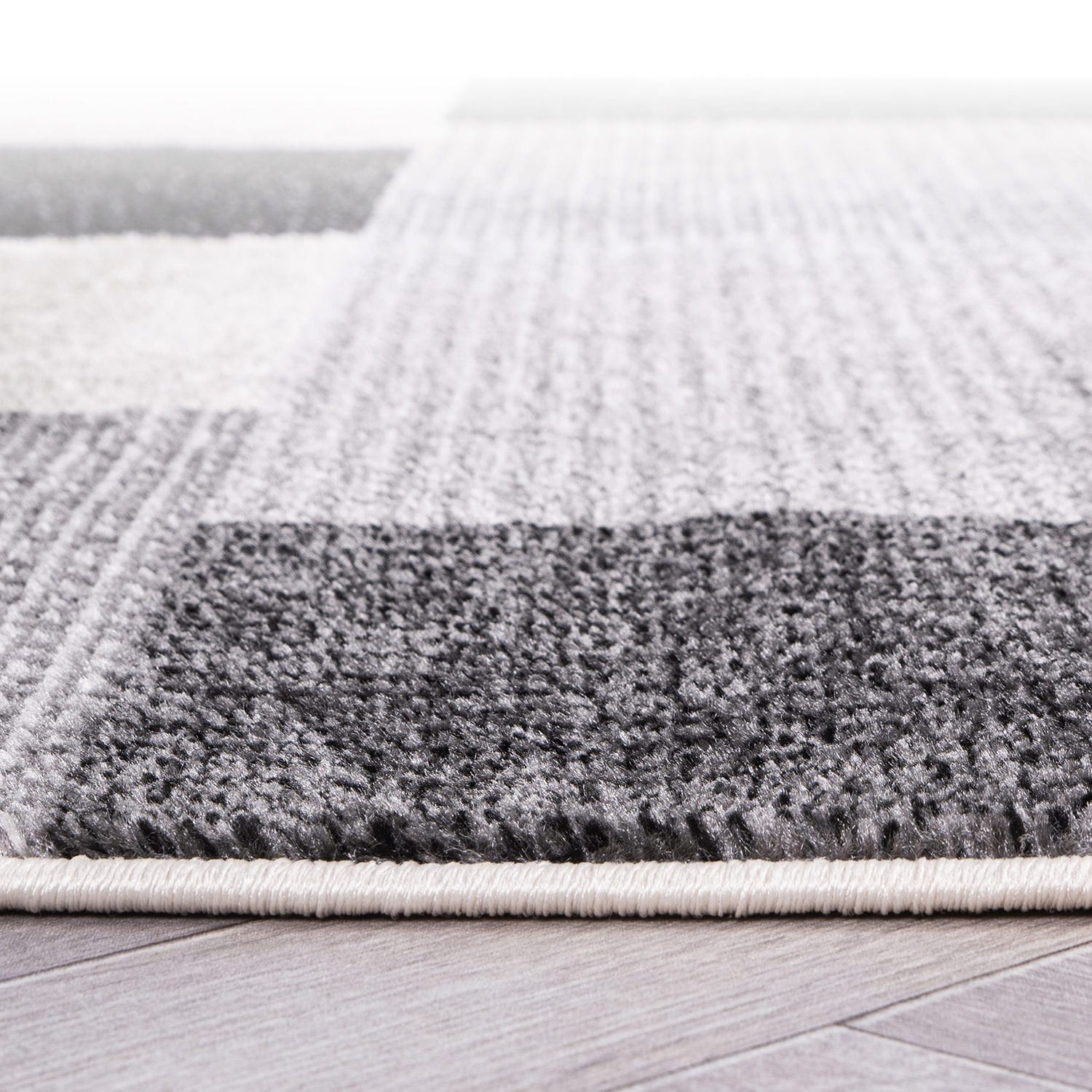 Modern Geometric Black and Gray Synthetic Rectangular Area Rug, 5' x 7'